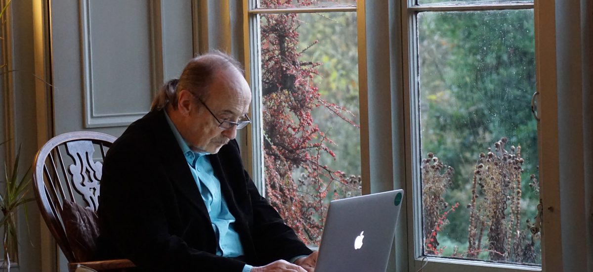 Picture of older man and computer from Unsplash