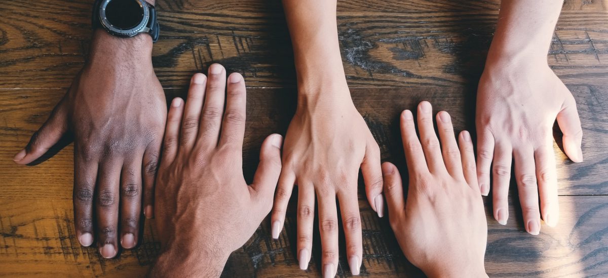 Image with four hands