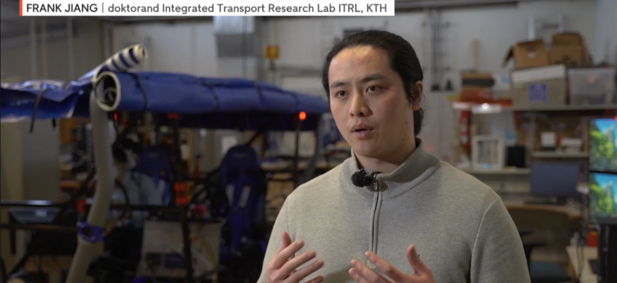 Picture of Frank Jiang demonstrating automated vehicles